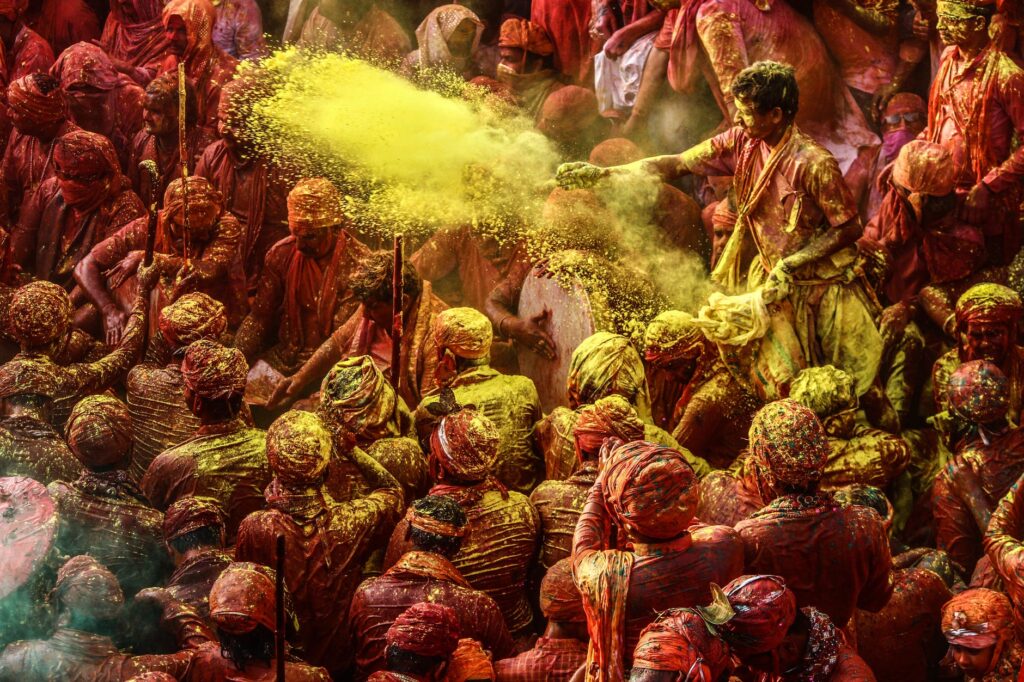 crowd of people covered in paint